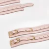 Pulgarias de bondage de cuero vegano