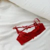 Conjunto de lencería roja transparente con moños