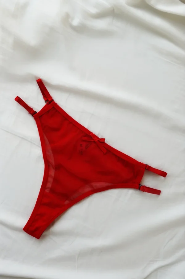 Conjunto de lencería roja transparente con moños